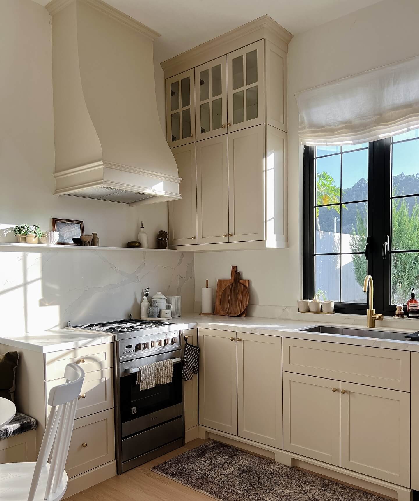 Creamy Kitchen Cabinets With Brass Hardware