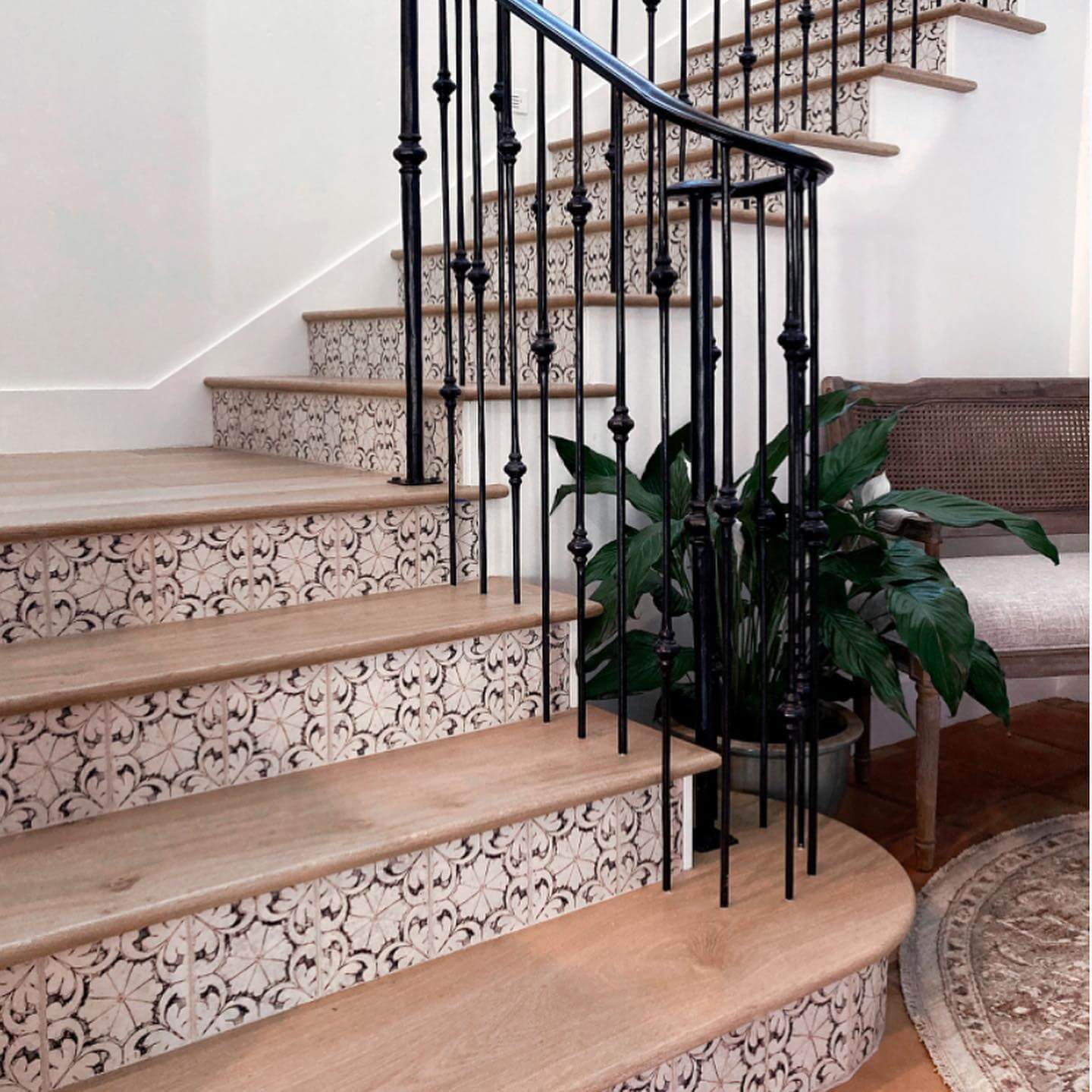 Ornate Patterned Tiles Frame Natural Wood Stair Risers