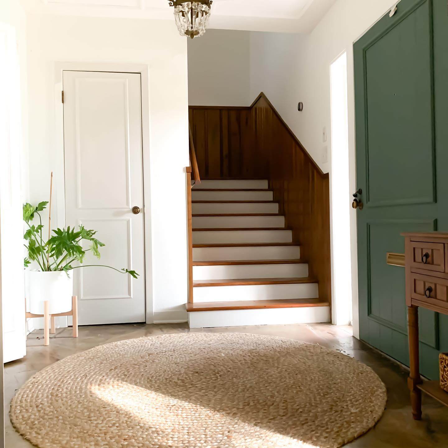 Crisp White Risers Create a Clean Contrast on Wood Stairs