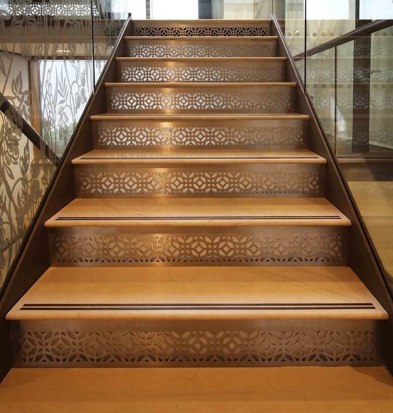 Laser-Cut Metal Panels Add Delicate Detail to Stair Risers