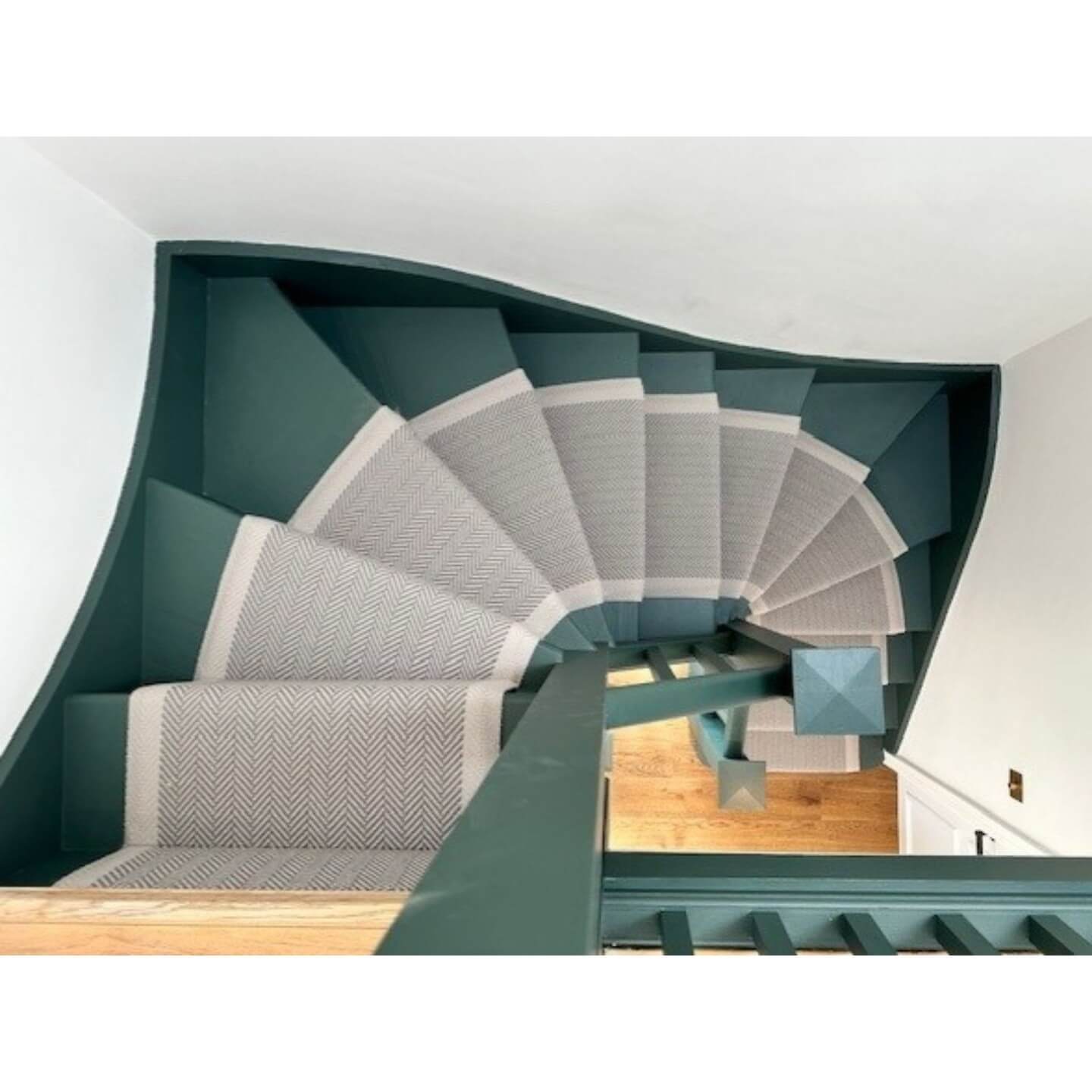 Herringbone Runner With White Binding Contrasts Deep Teal Walls