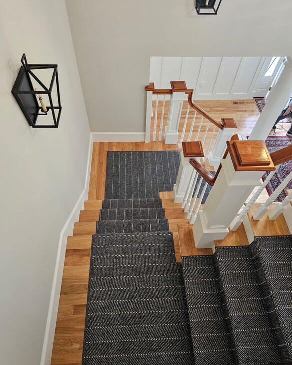 Dark Stair Runner With Subtle White Pinstripe Detail