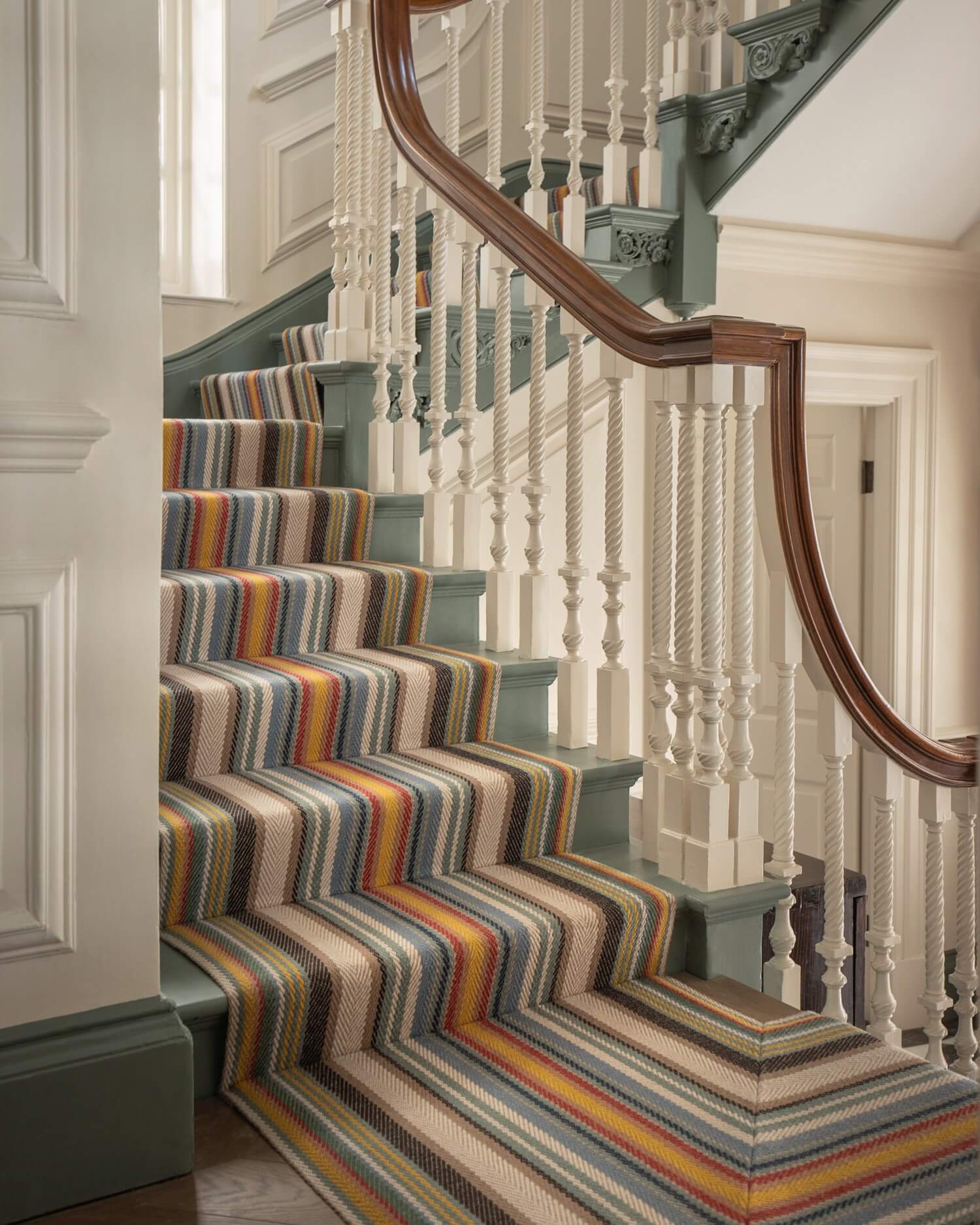 Multicolor Chevron Stripes Add Dynamic Pattern to Stairs
