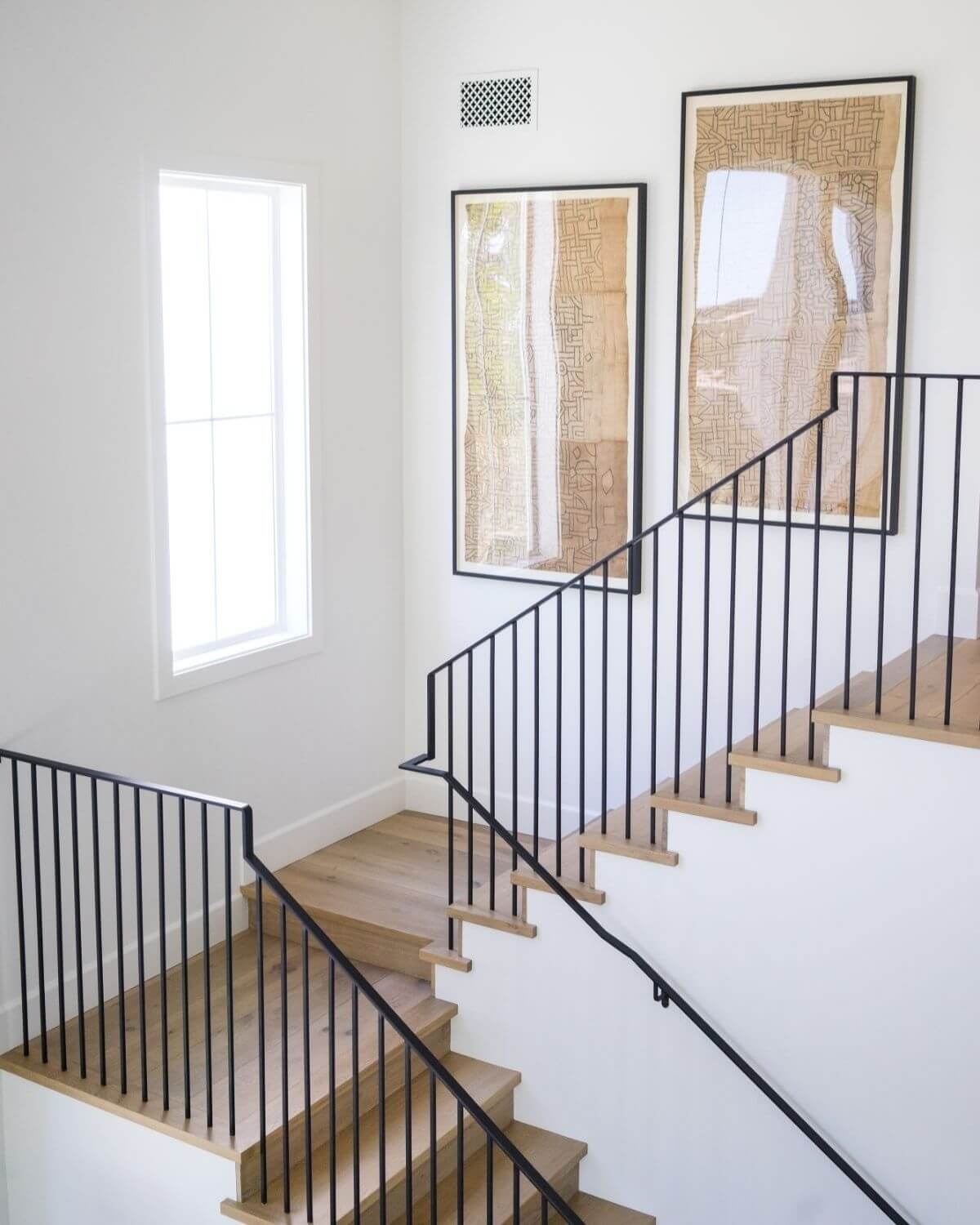 Oversized Textured Prints Add Global Appeal to Stairwell