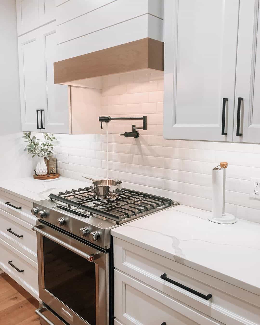 Pot Filler Faucet Above White Subway Tile Backsplash