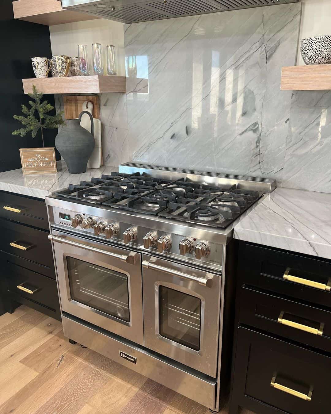 Large-Format Marble Slab Backsplash Creates a Seamless Look