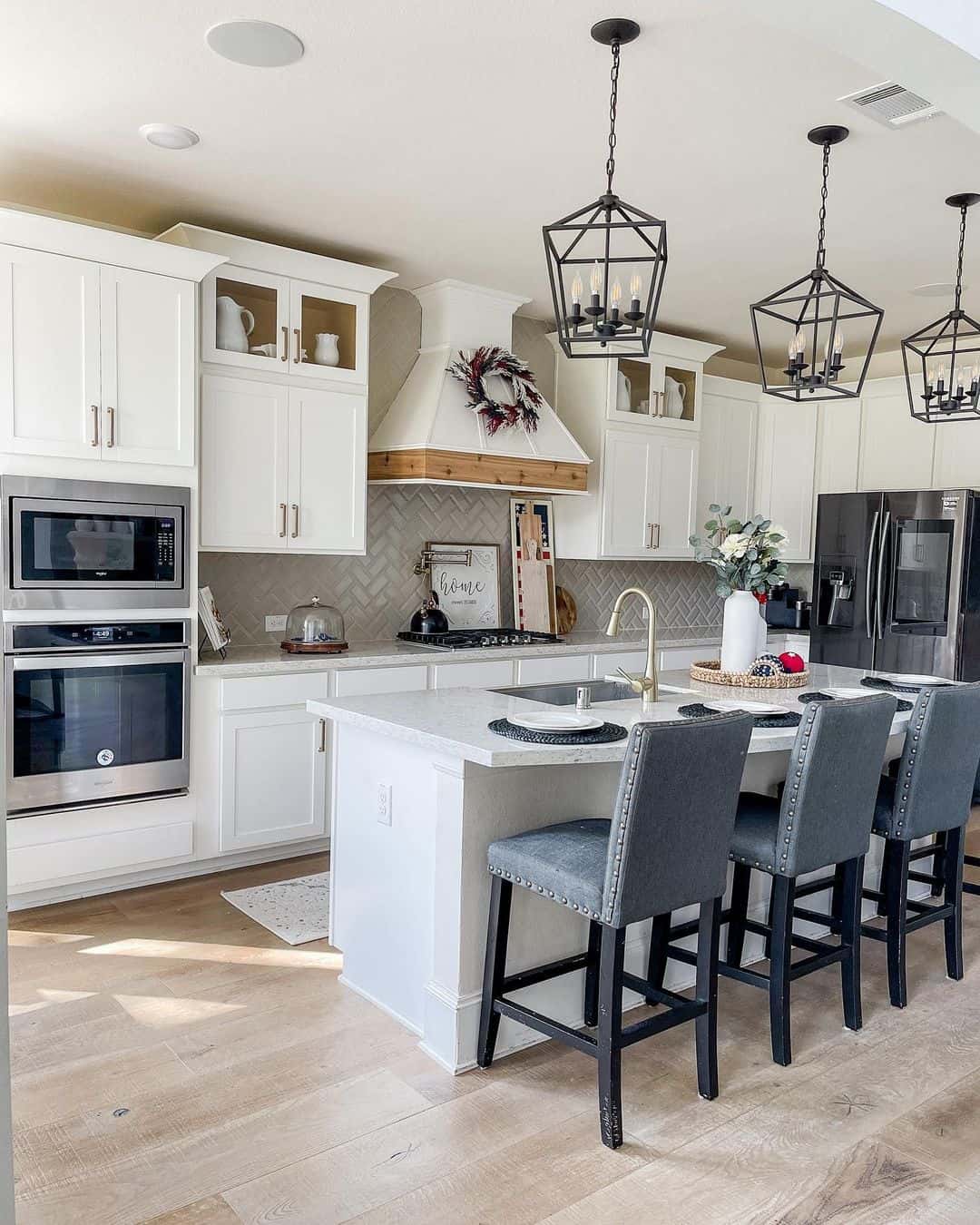 Herringbone Tile Backsplash Adds Subtle Pattern to White Kitchen