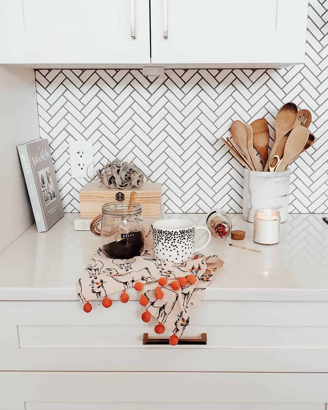 Herringbone Pattern Adds Geometric Interest to White Kitchen