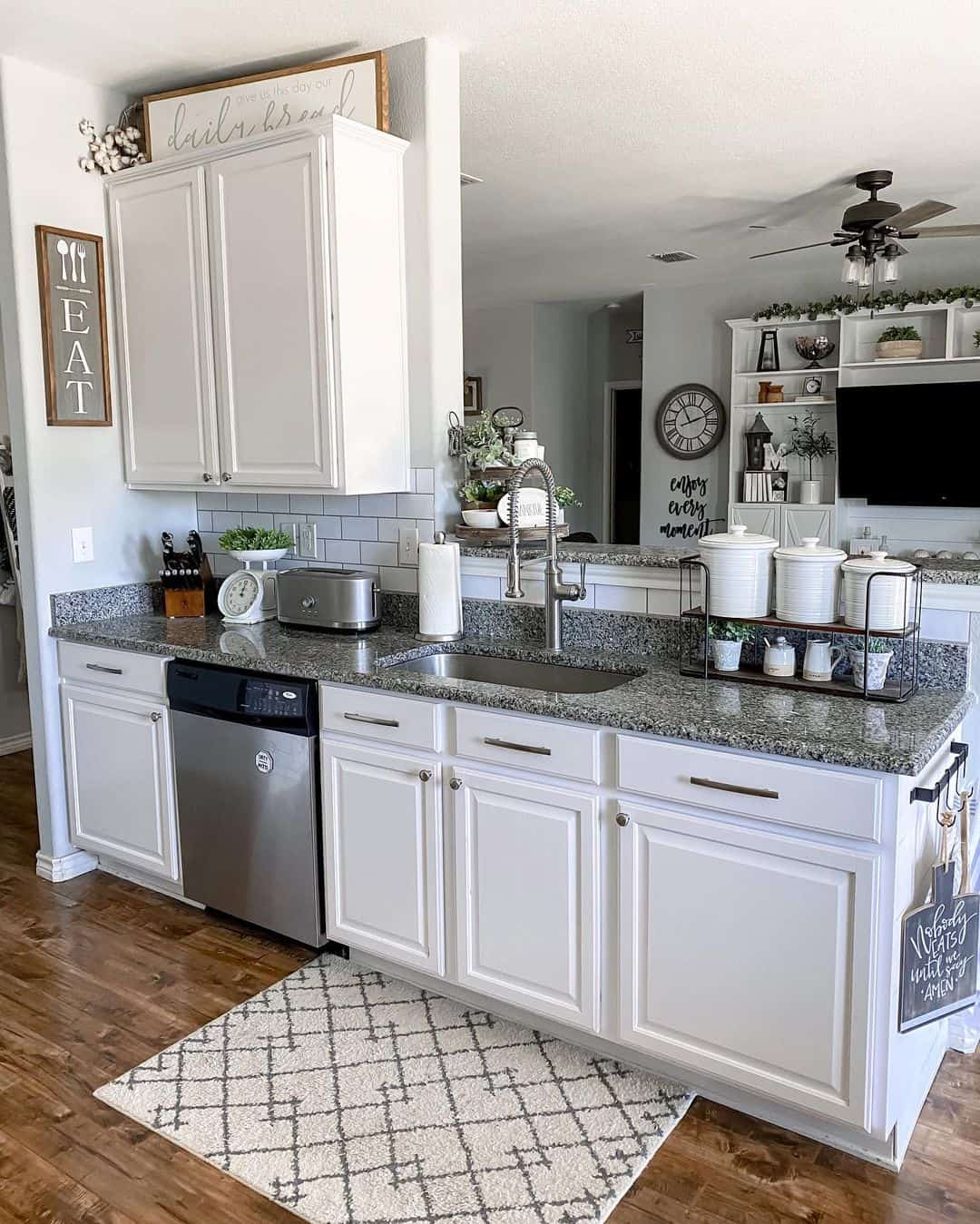 Wooden Sign Above Cabinets Adds a Farmhouse Touch