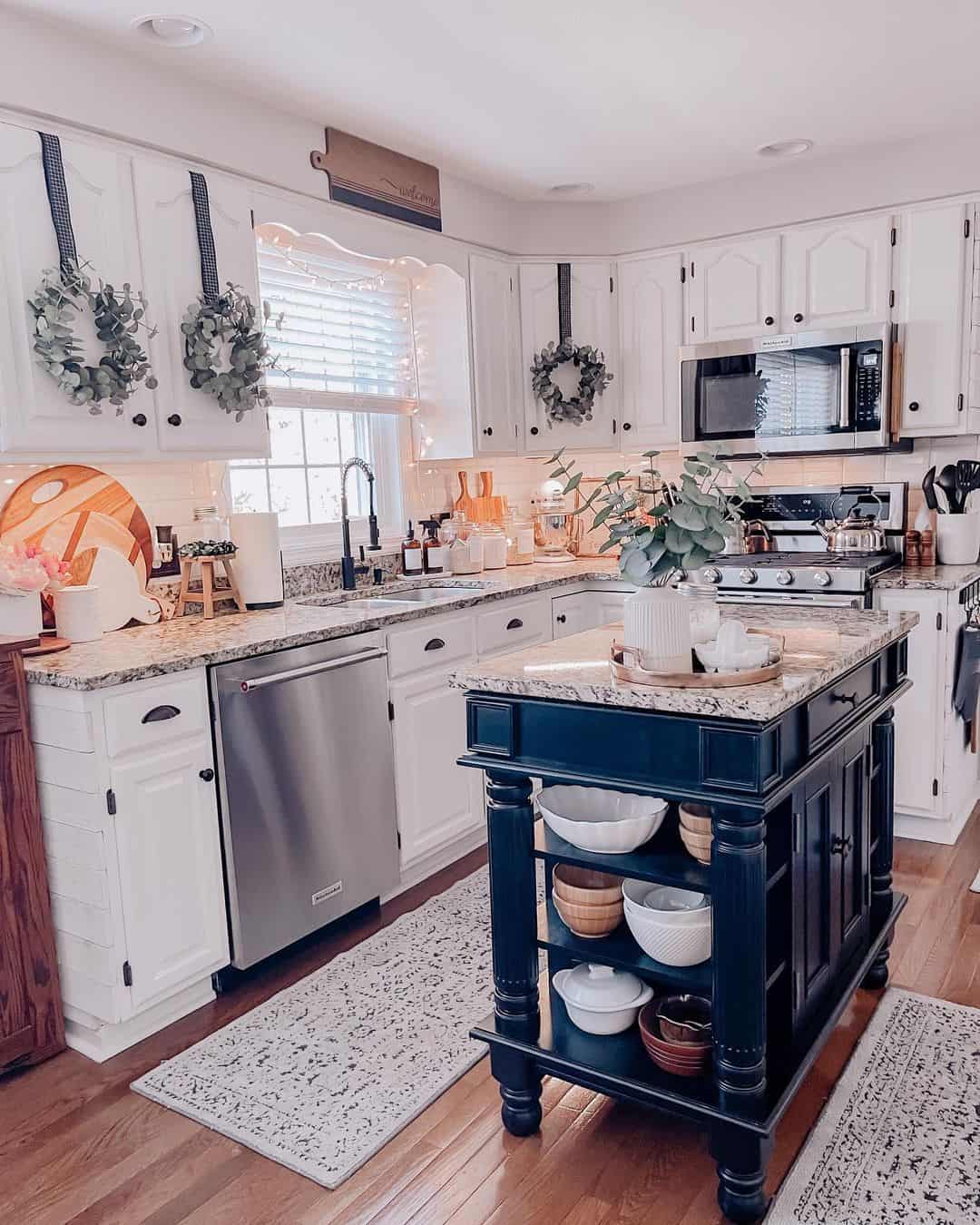 Dark Island With Open Shelving Displays White Bowls