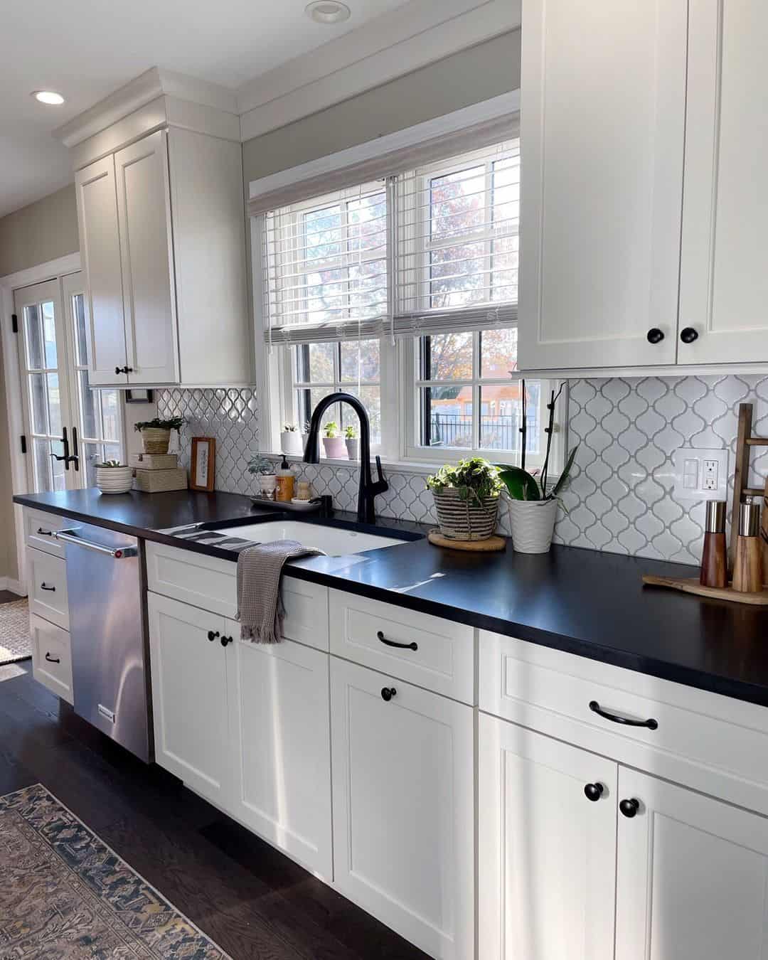 Geometric Pattern Backsplash Adds Graphic Interest Behind White Cabinets
