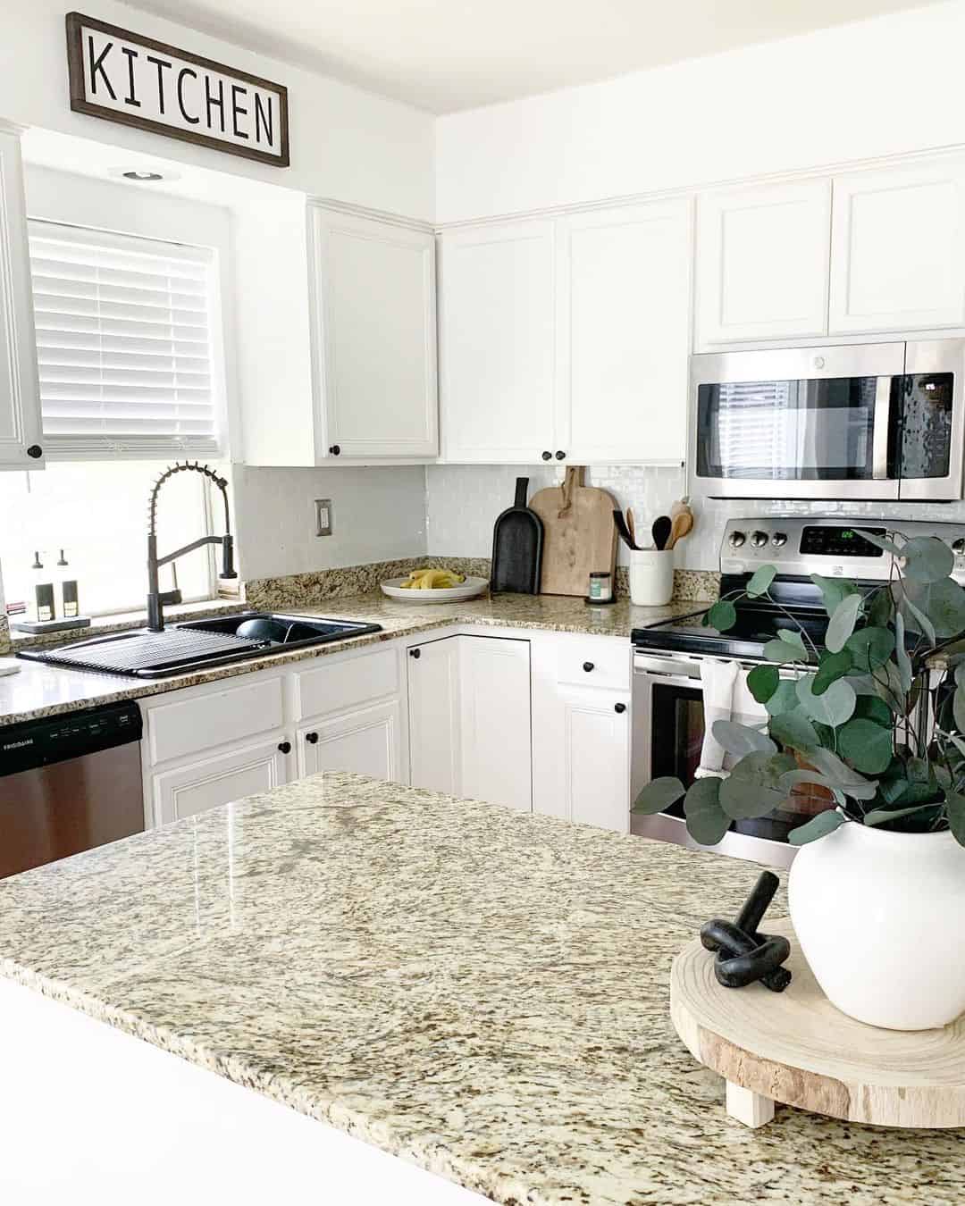 Speckled Granite Countertops Add Pattern Behind White Cabinets