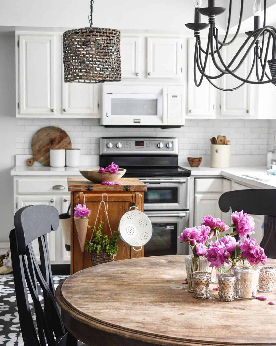 Wooden Rolling Cart Adds Rustic Storage Next to White Cabinets