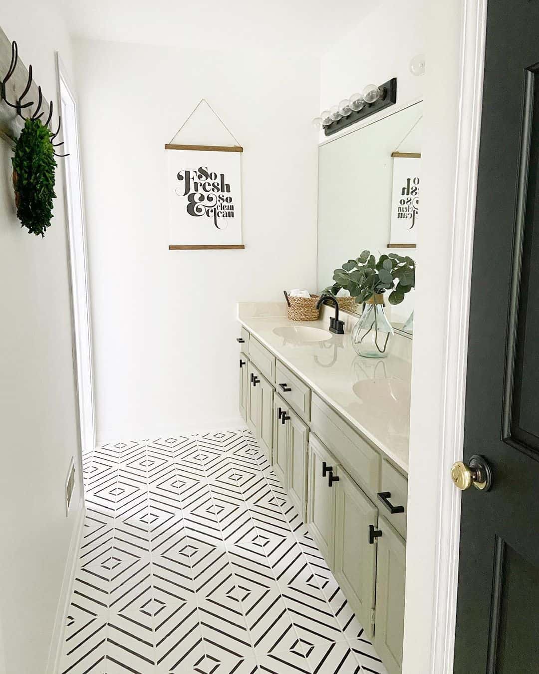 Pale Gray Vanity with Black Bin Pulls Offers Subtle Contrast