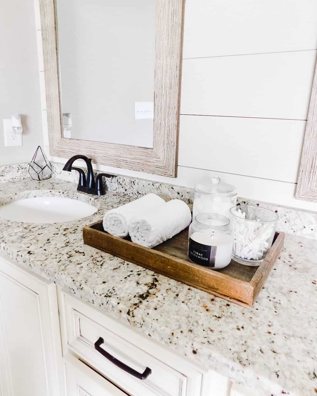 Wooden Tray Organizes Rolled Towels and Bath Essentials