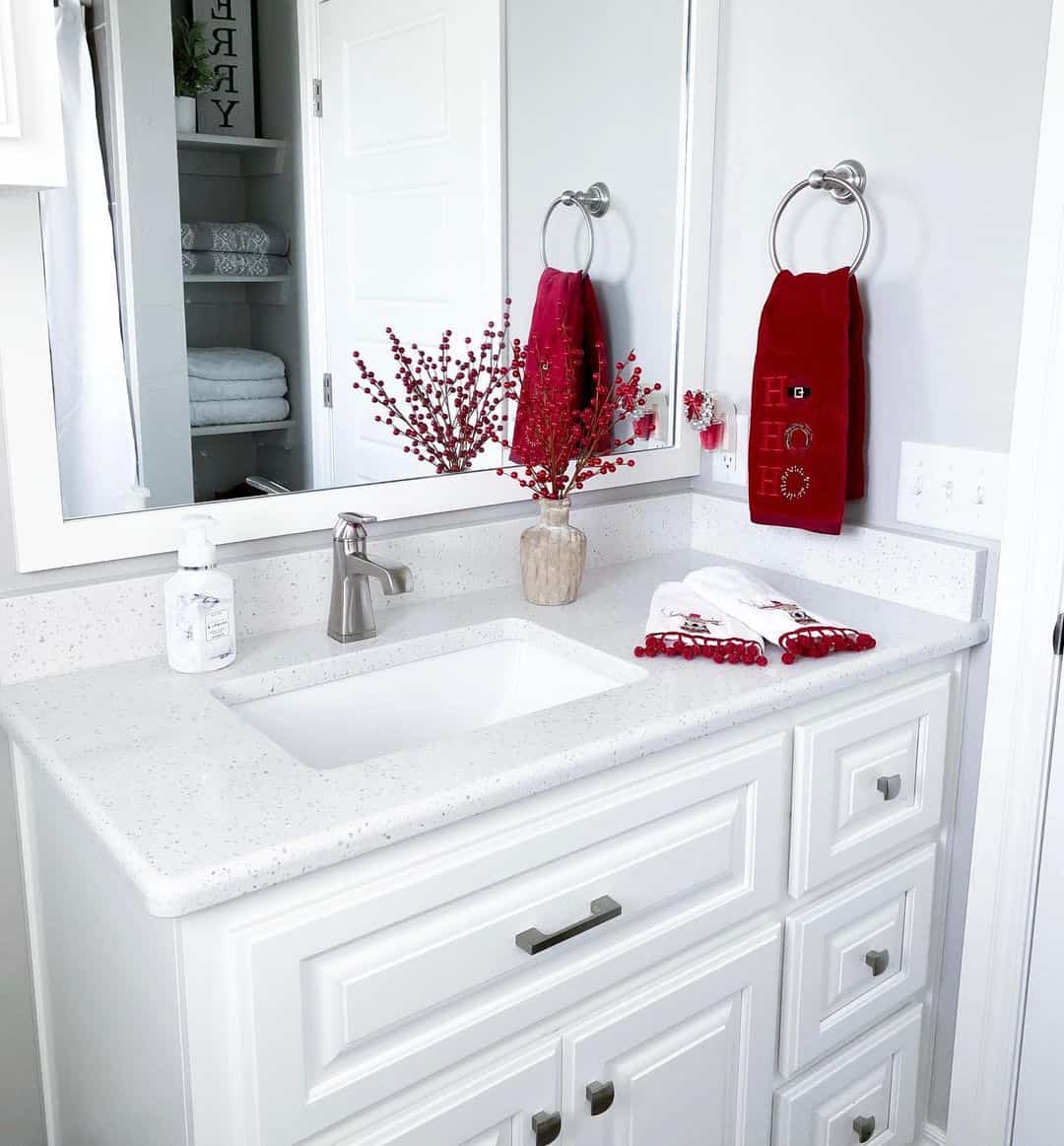 Textured Vase Holds Red Berry Sprigs for Seasonal Color