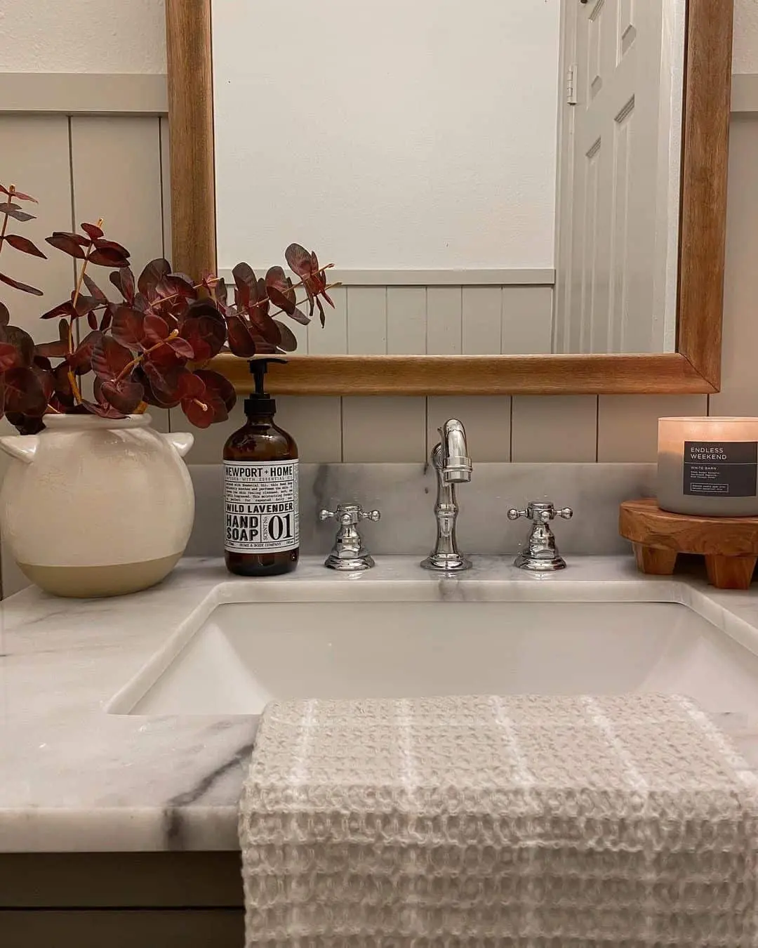 Wooden Pedestal Lifts Candle for Varied Countertop Height