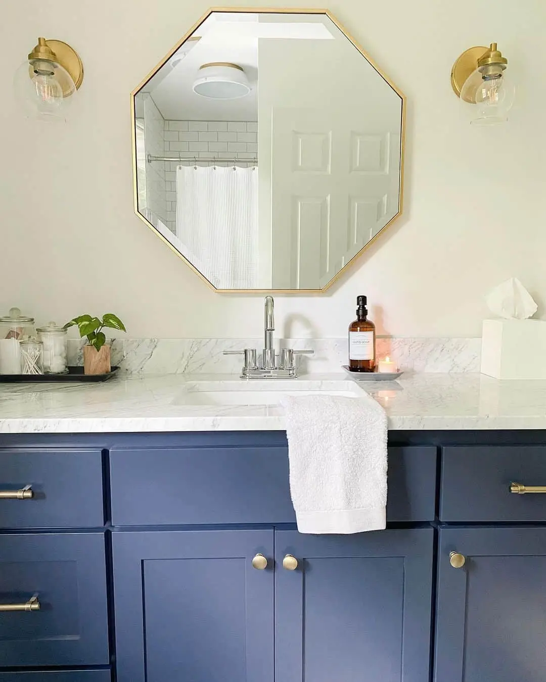 Octagonal Mirror Adds Geometric Focal Point Above Vanity