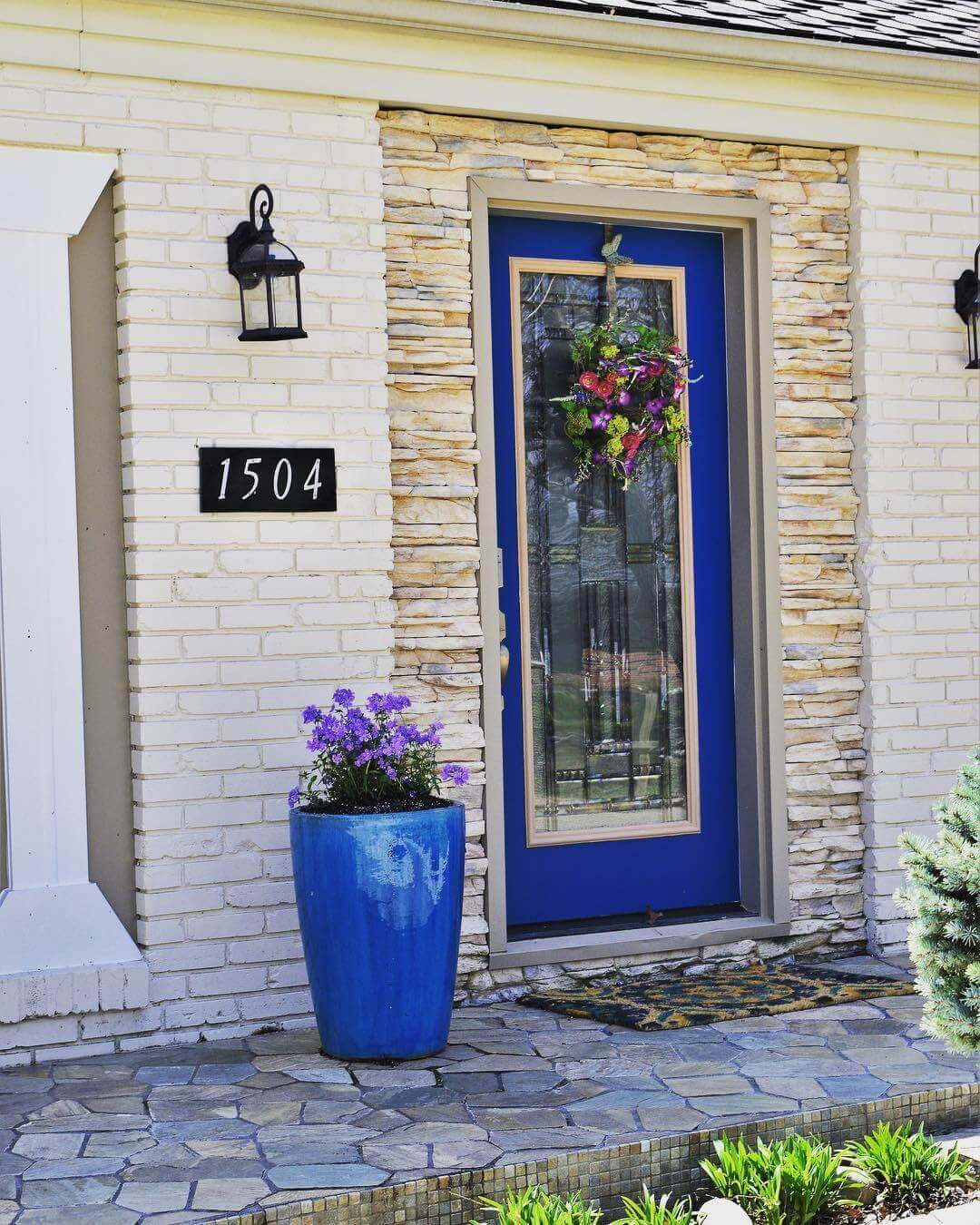 Tall Blue Planter Adds a Pop of Color Beside the Door