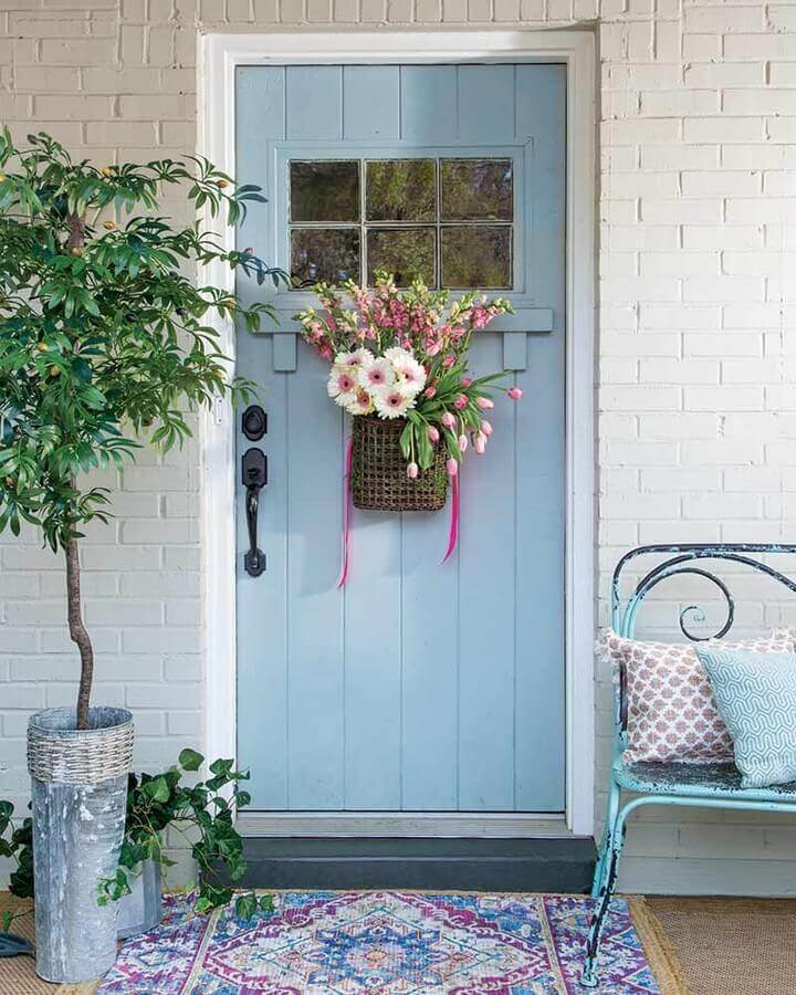 Woven Basket Adds a Burst of Spring Flowers to Your Blue Door
