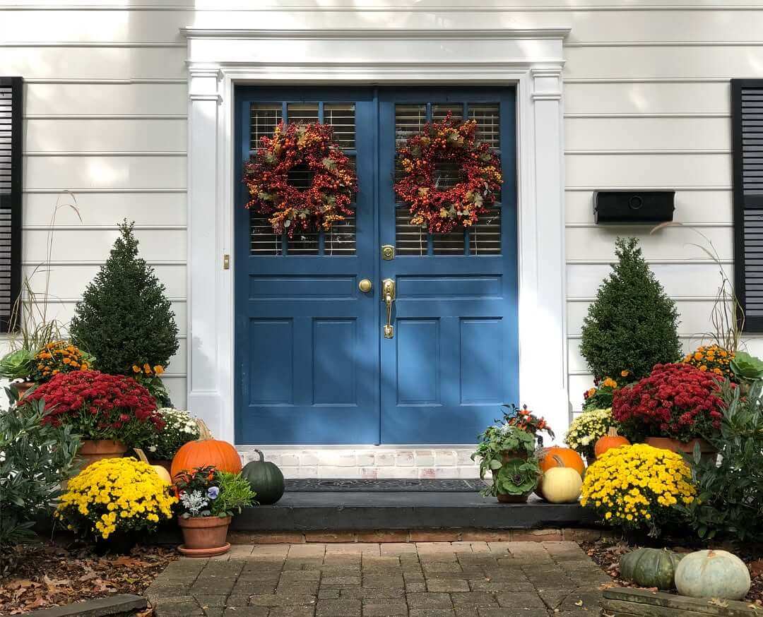 Berry Wreaths Add Seasonal Color to Paned Doors