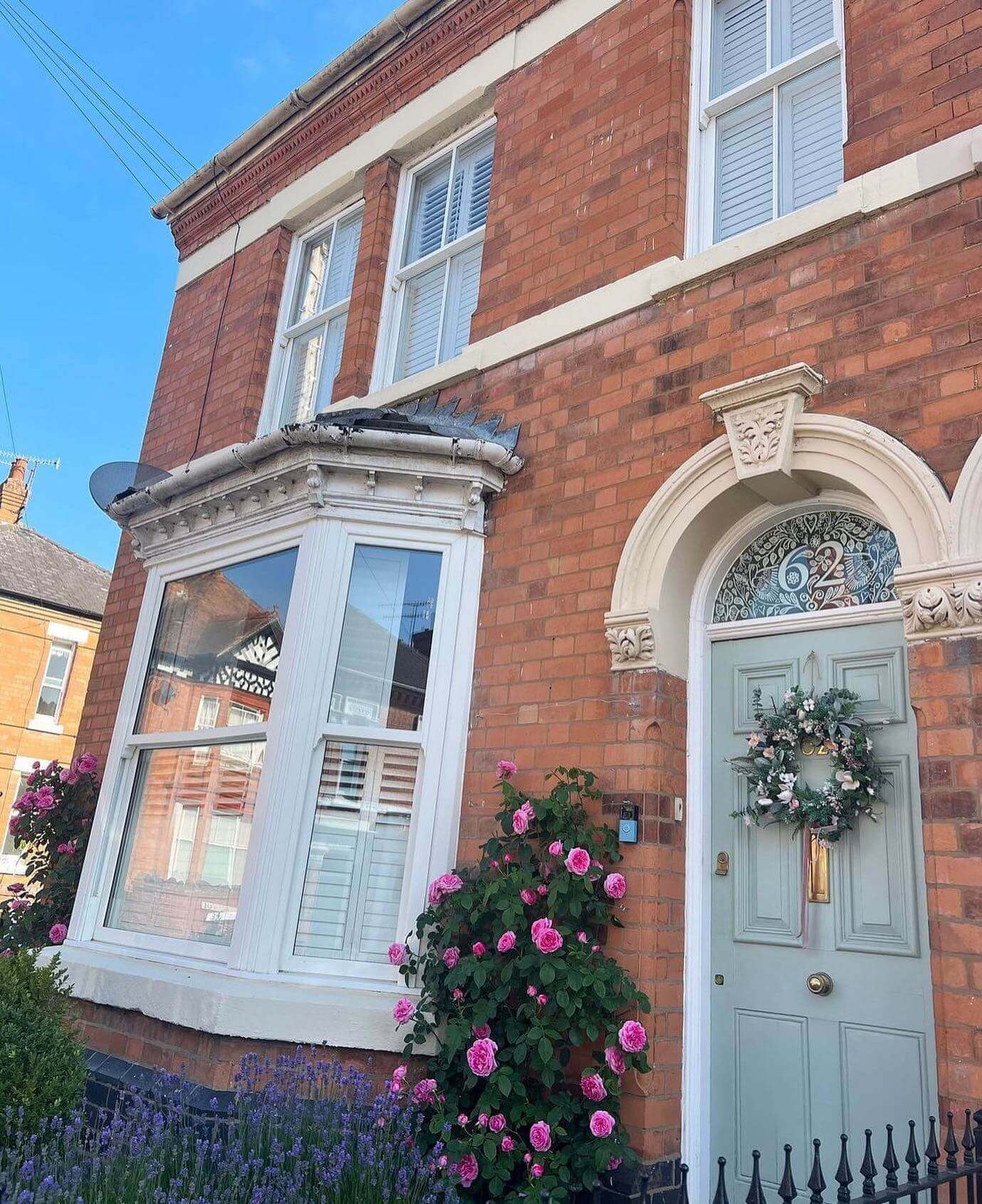 Complement a Soft Blue Door with a Floral Wreath