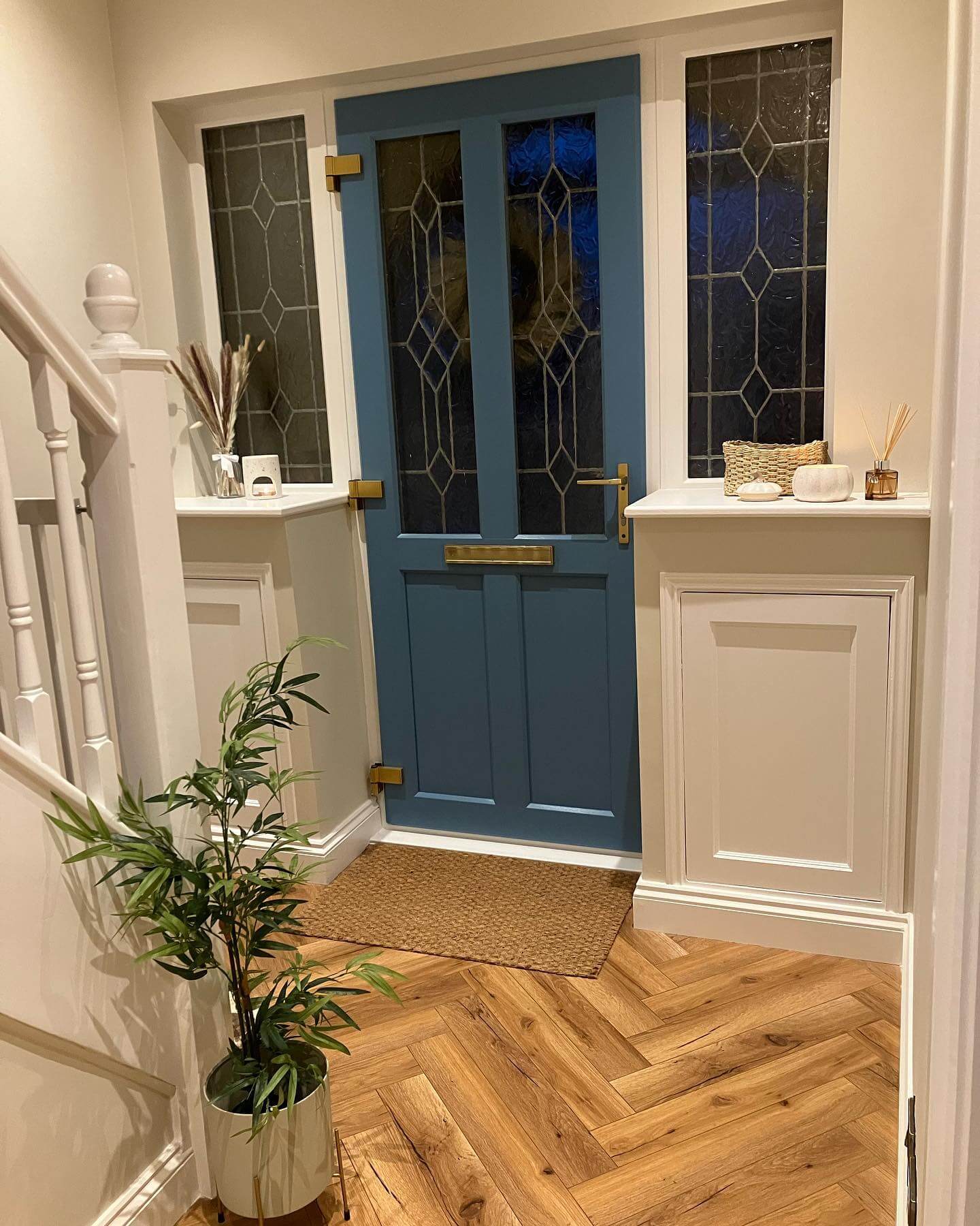Deep Blue Door With Geometric Stained Glass Panels