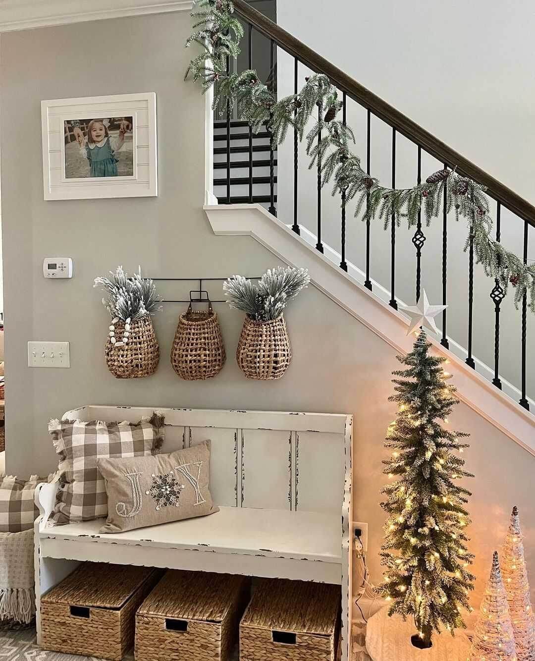 Woven Baskets on a Rail Offer Textured Entryway Displays