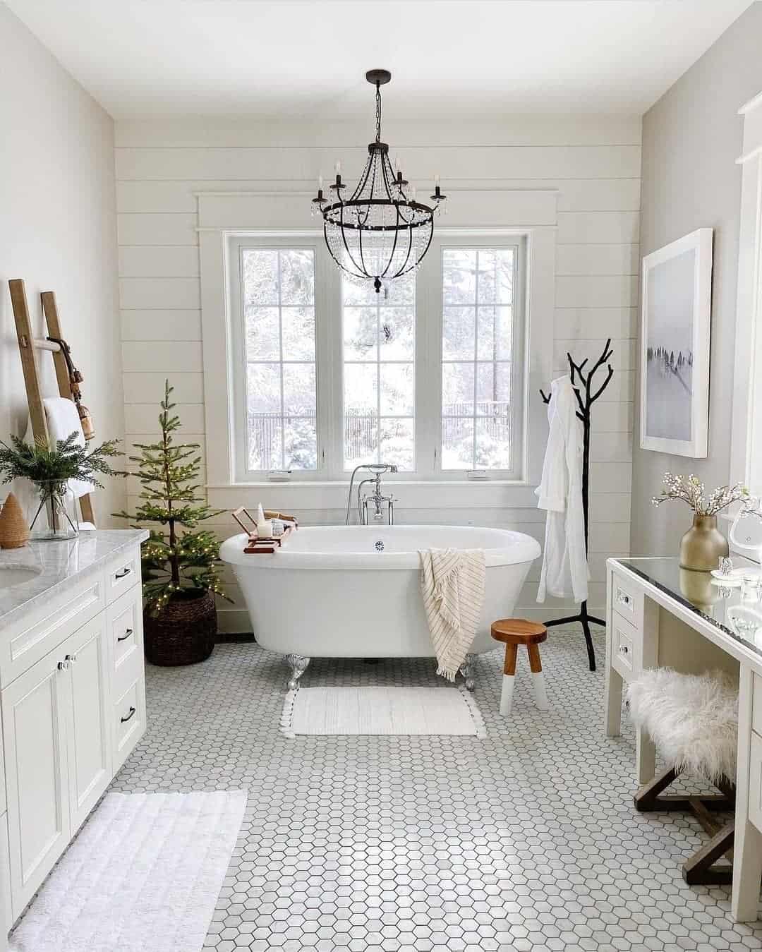 Tall Ladder with Towels and Greenery Adds Rustic Vertical Storage