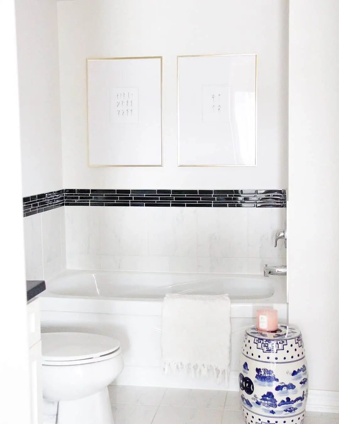 Pair of Delicate Line Art Prints Frame the Bathtub