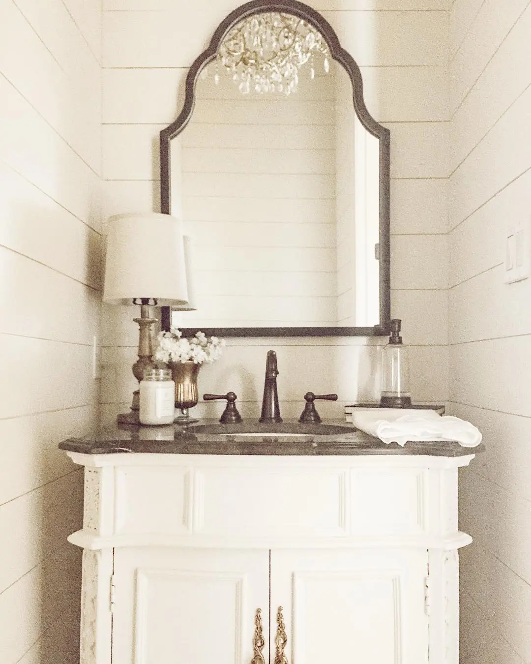 Arched Mirror and Chandelier Add Glamour