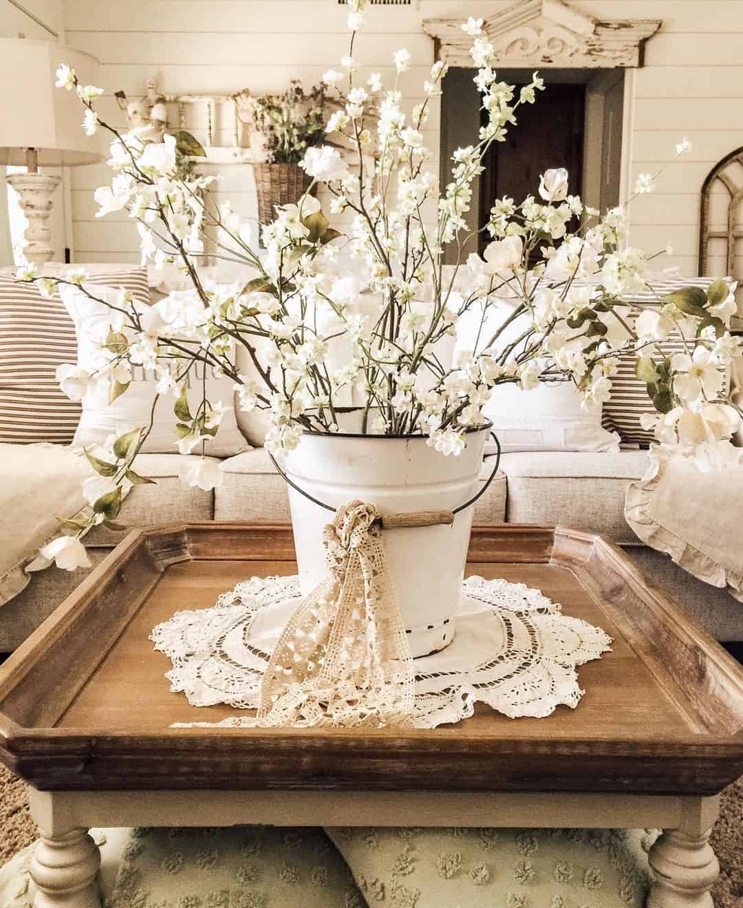 White Enamel Pail Holds Delicate White Blossoms