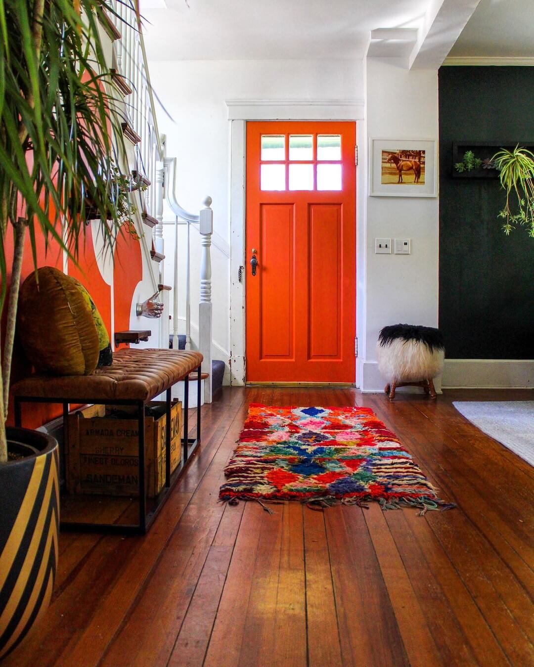 Bright Orange Door With Geometric Runner
