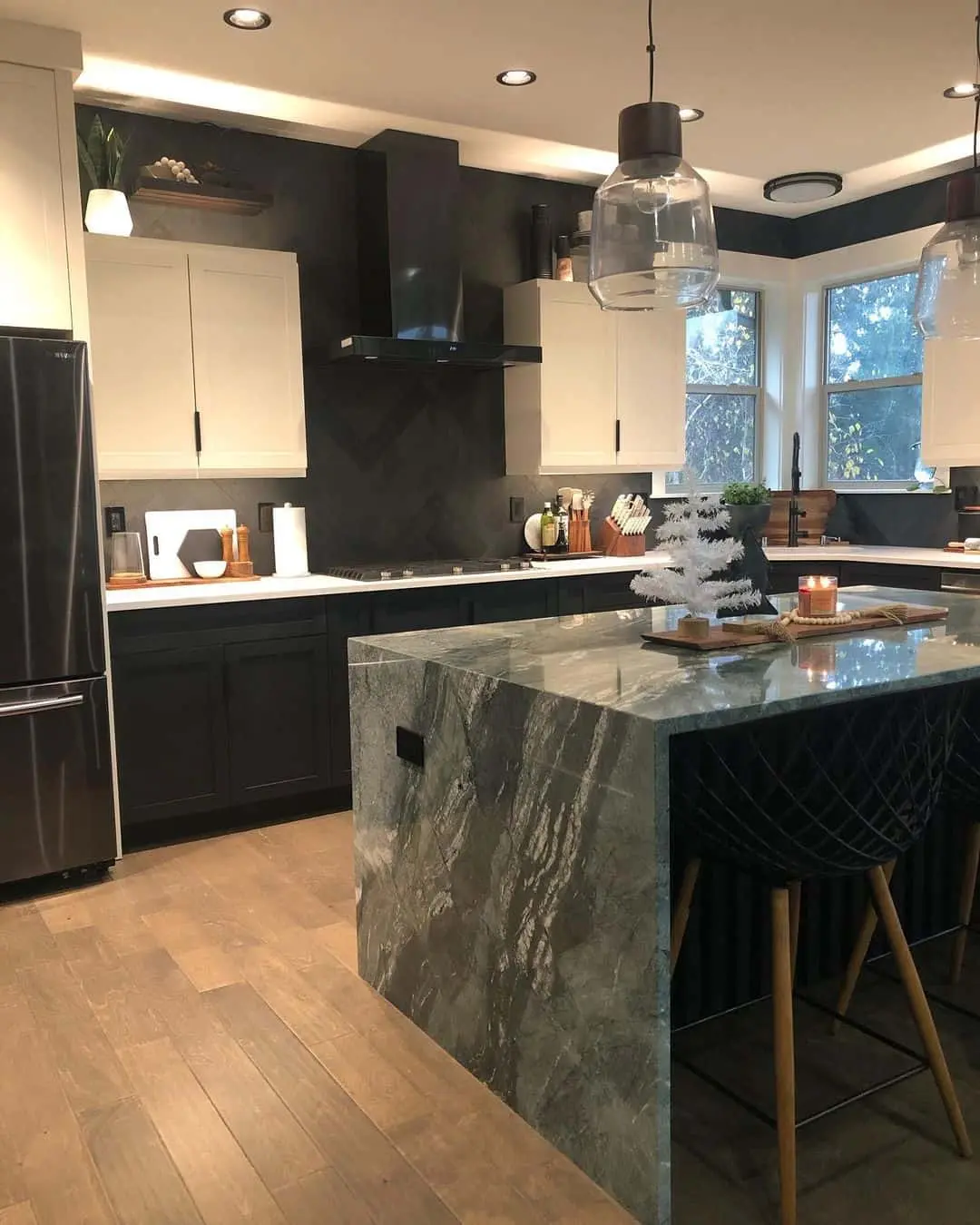 Dark Herringbone for Depth Behind the Stove
