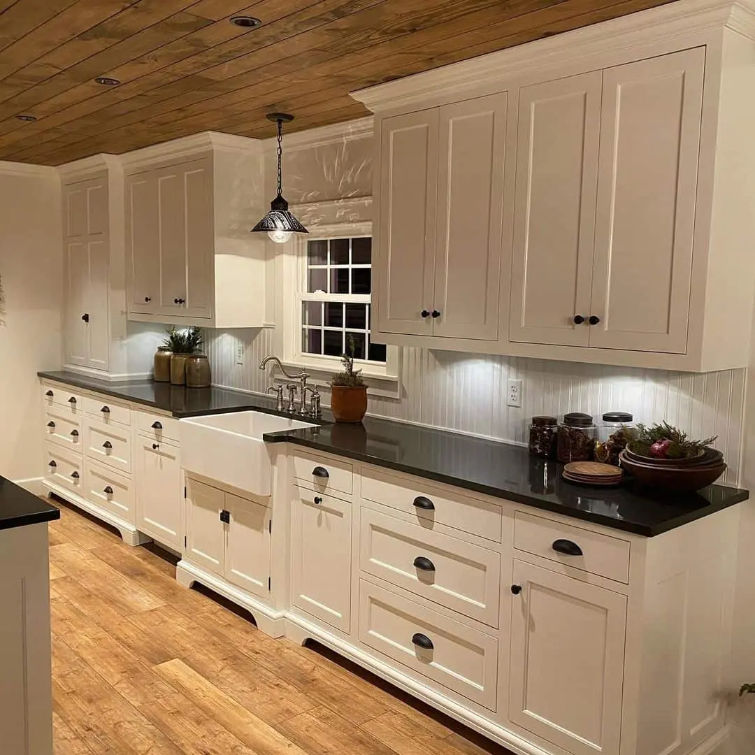 Ground White Cabinets with Dark Countertops
