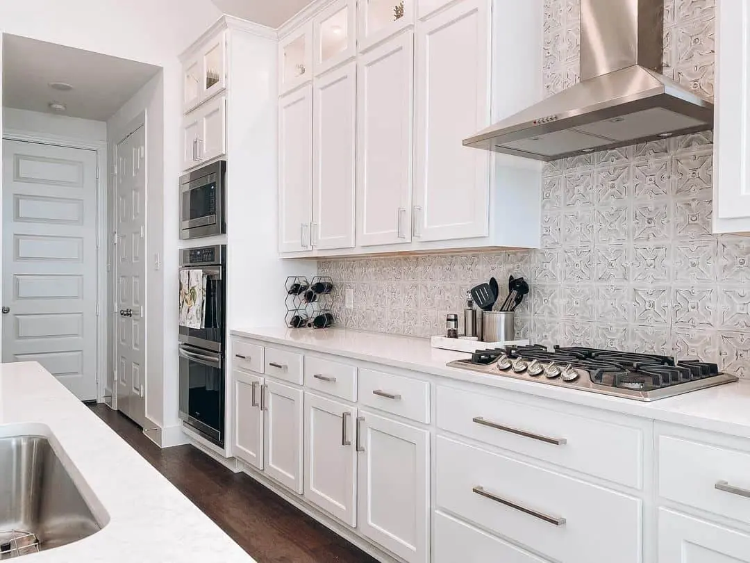 Textured Tile Backsplash Adds Pattern Above the Stove