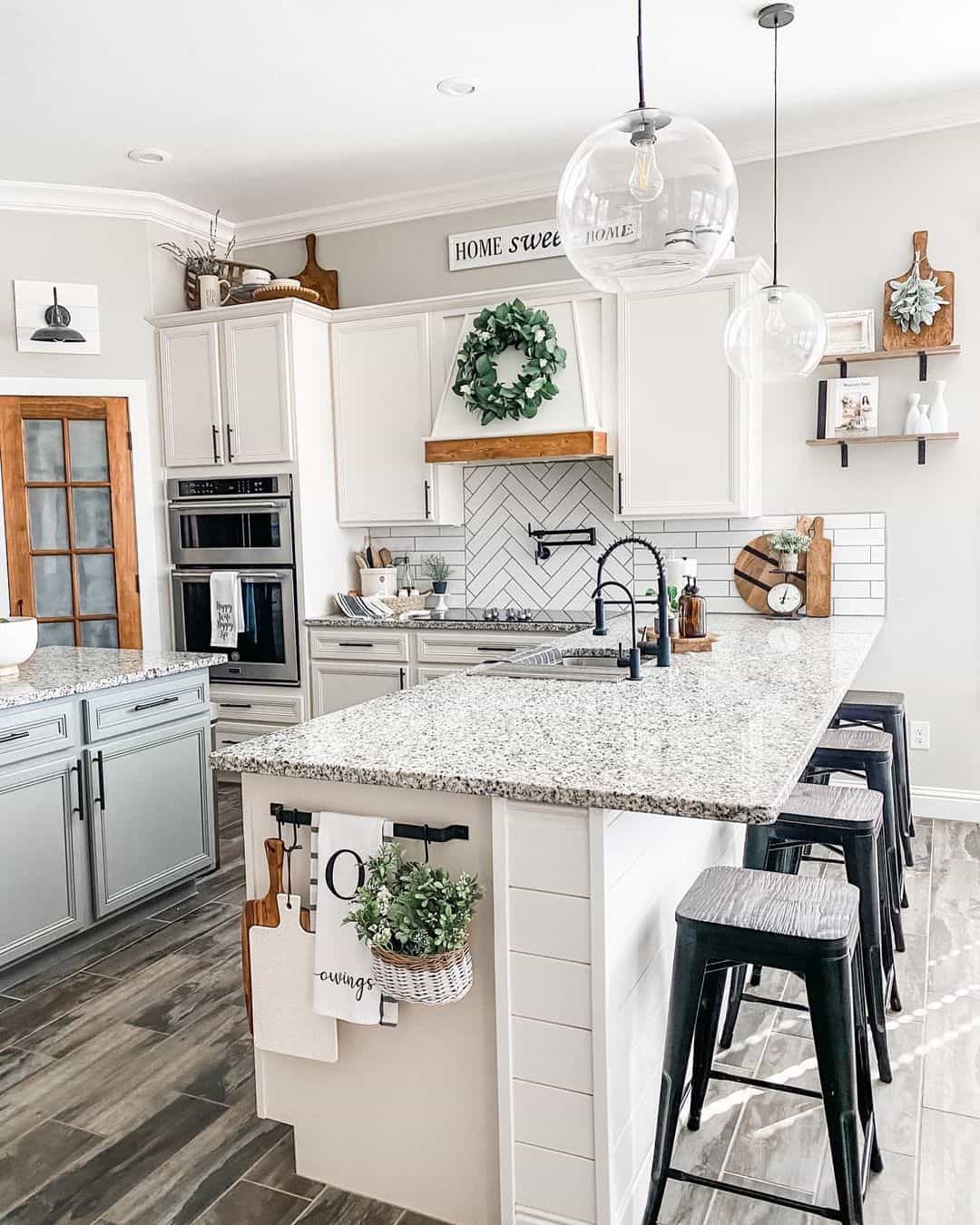 Wood Accents Frame a Greenery Wreath Over the Range