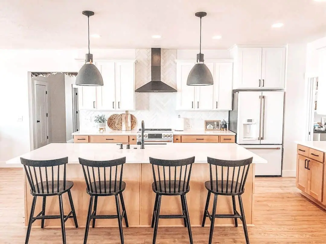 White Herringbone Backsplash with Textured Wood Cabinets