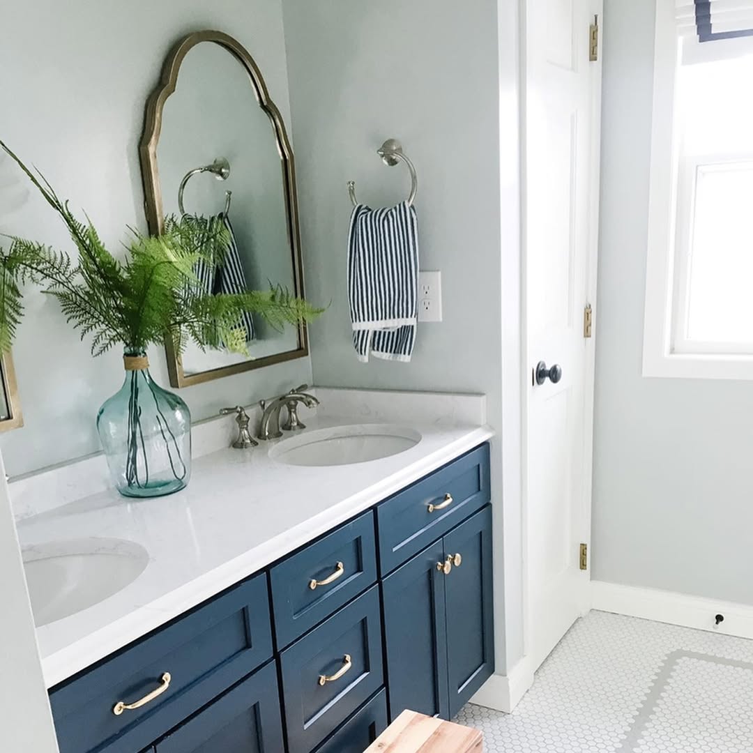 Reflect Stripes and Greenery With an Ornate Gold Mirror