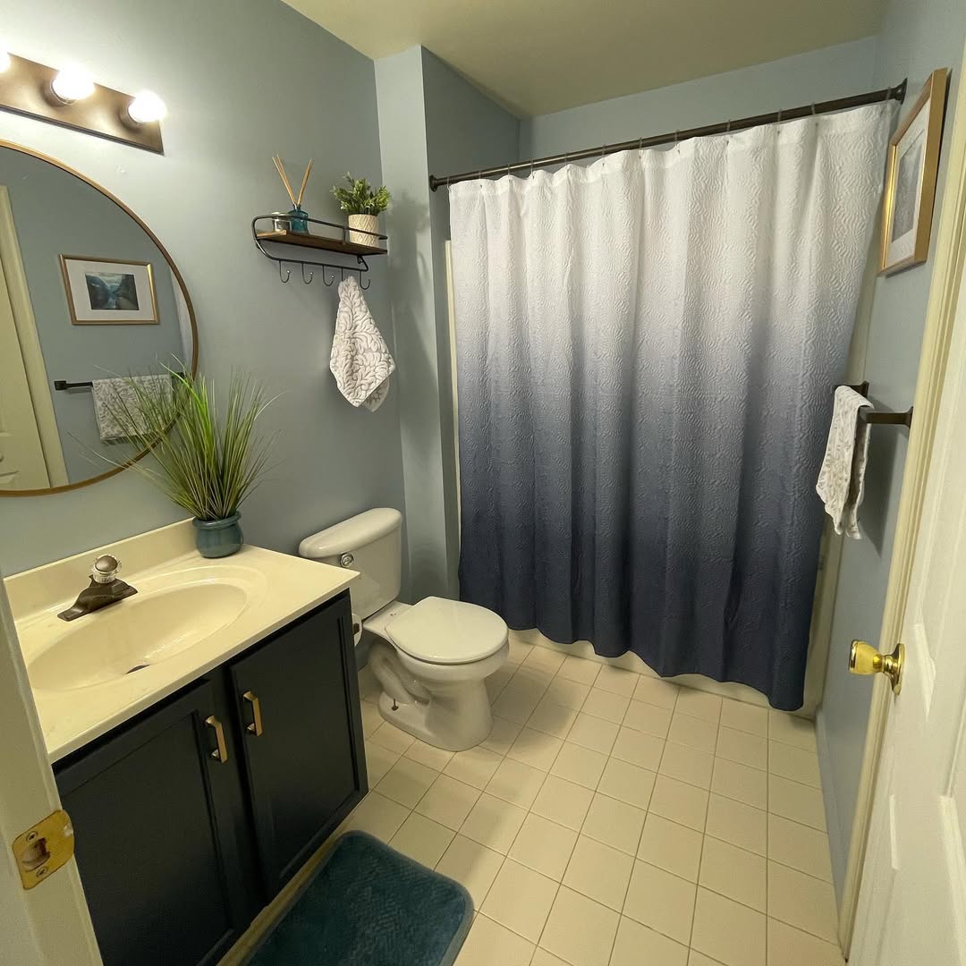 Ombre Shower Curtain Creates a Gradient Navy Focal Point