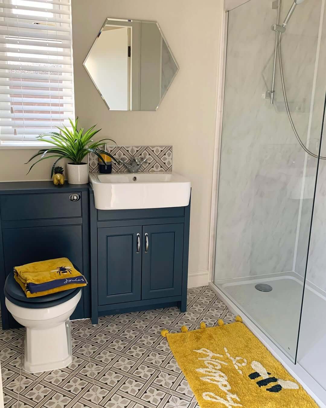 Hexagonal Mirror Adds Geometric Interest Above Sink