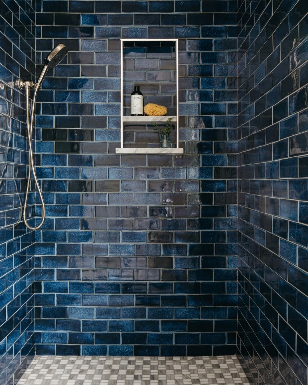Recessed Niche With Marble Shelf Holds Shower Essentials