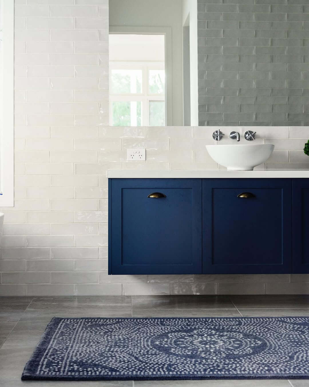 Deep Navy Vanity Doors With Aged Brass Pulls