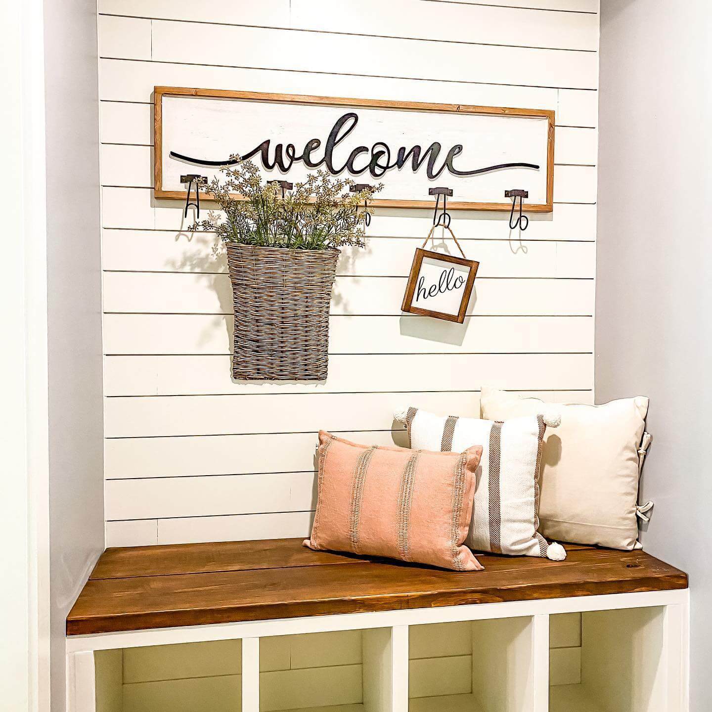 Wooden Bench With White Cubbies Holds Cushions