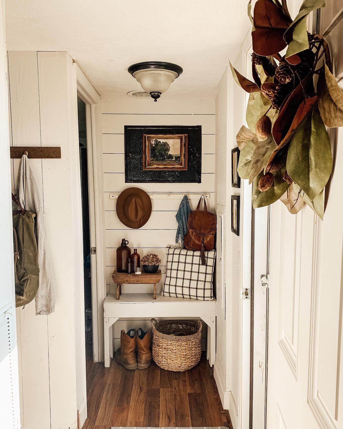Shiplap Walls Frame a Rustic Entryway Vignette