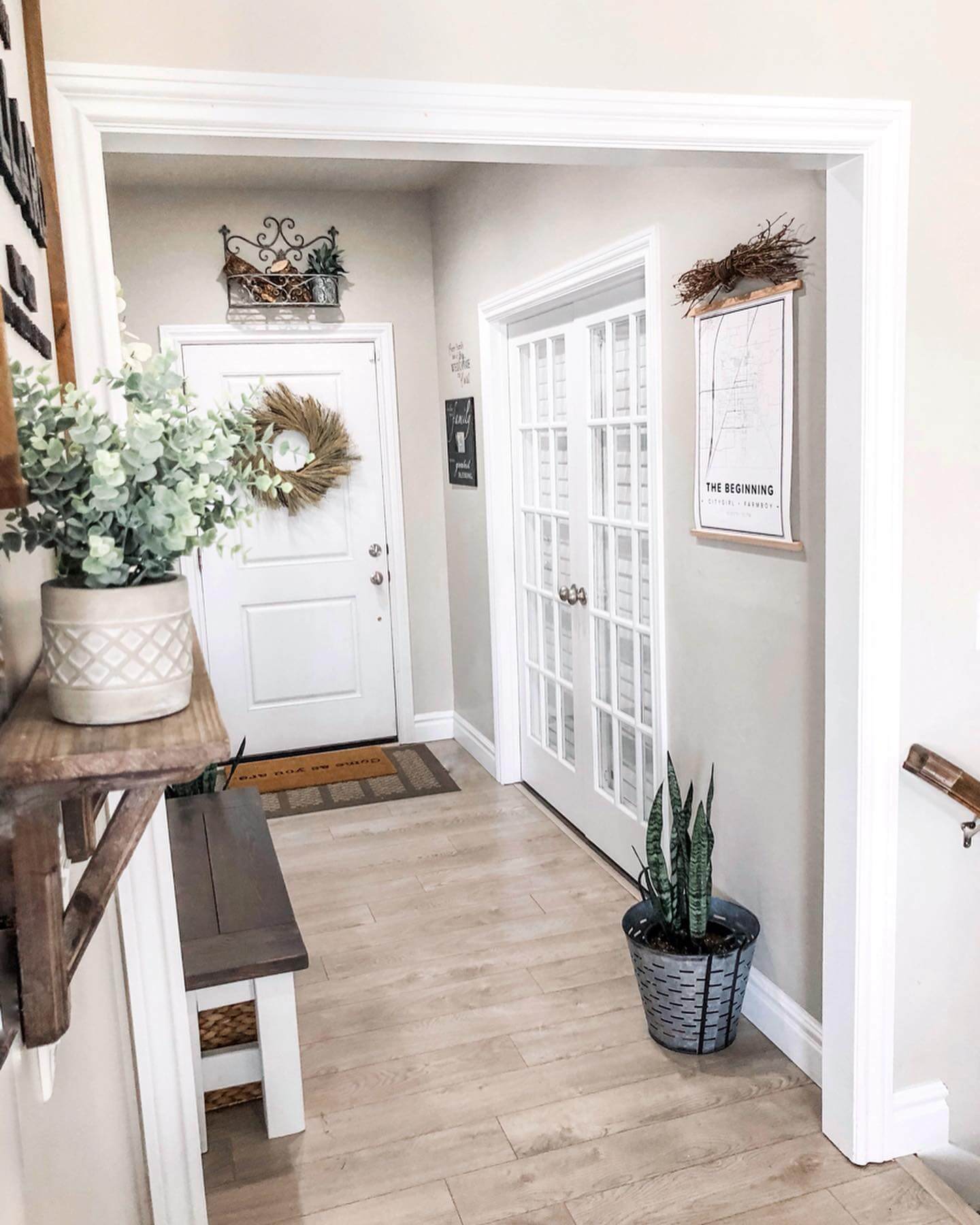 Entryway Map Art Hung With Twig Bundle