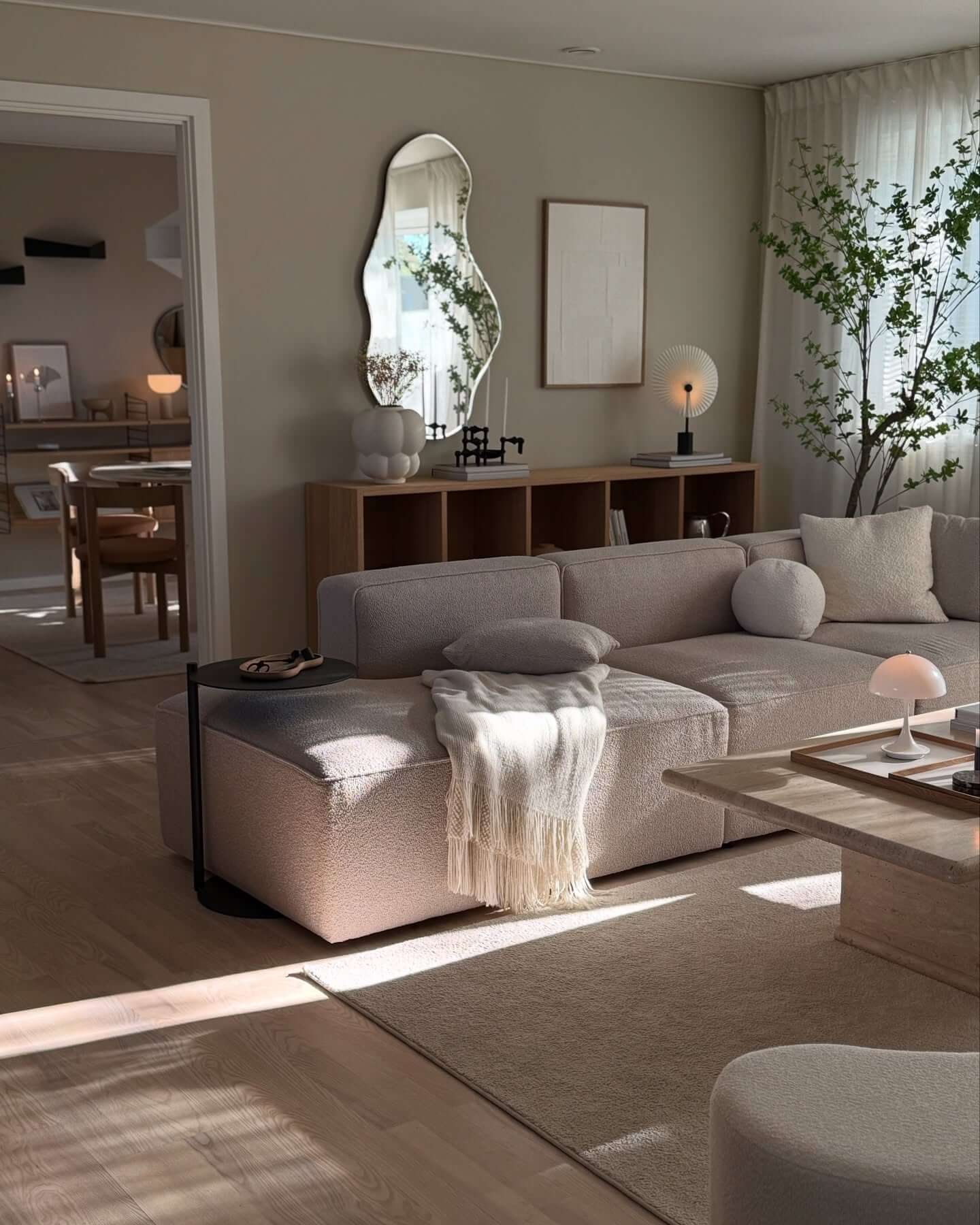 Abstract Mirror Adds Organic Shape to Walls