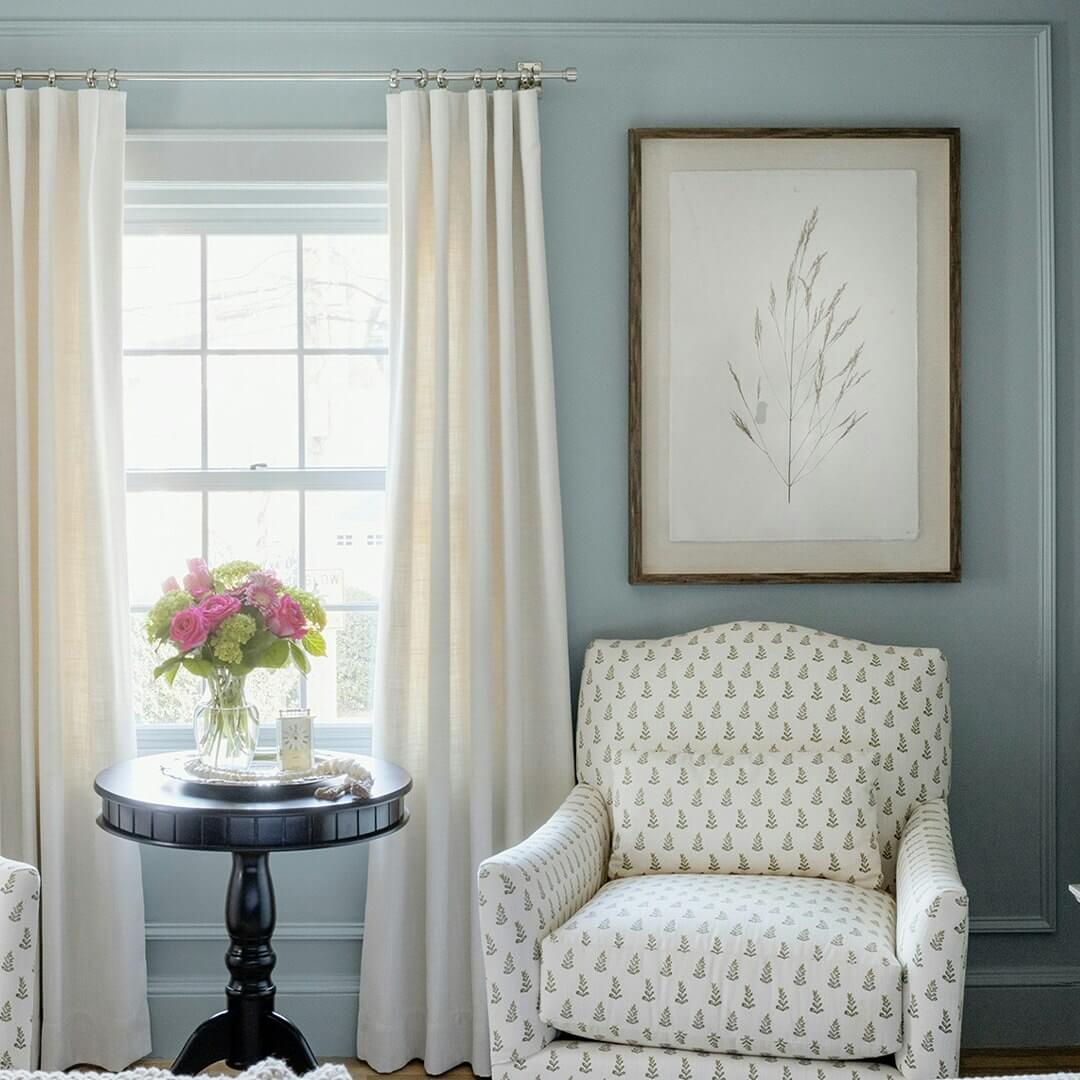 Delicate Line Art Complements Soft Blue Walls