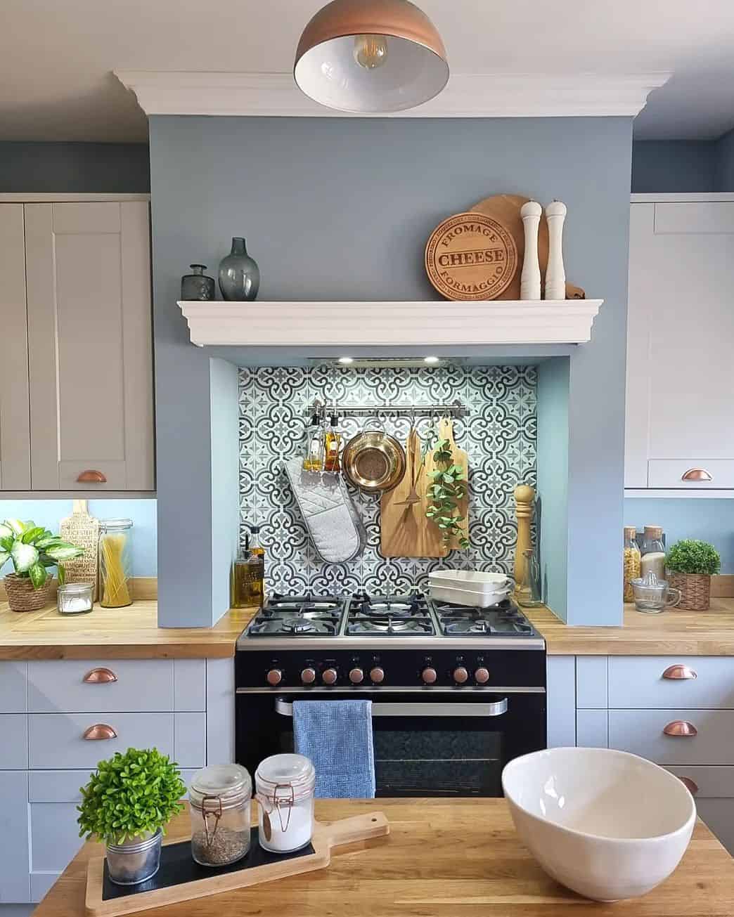 Patterned Tile Splashback Behind Stove Adds Decorative Flair