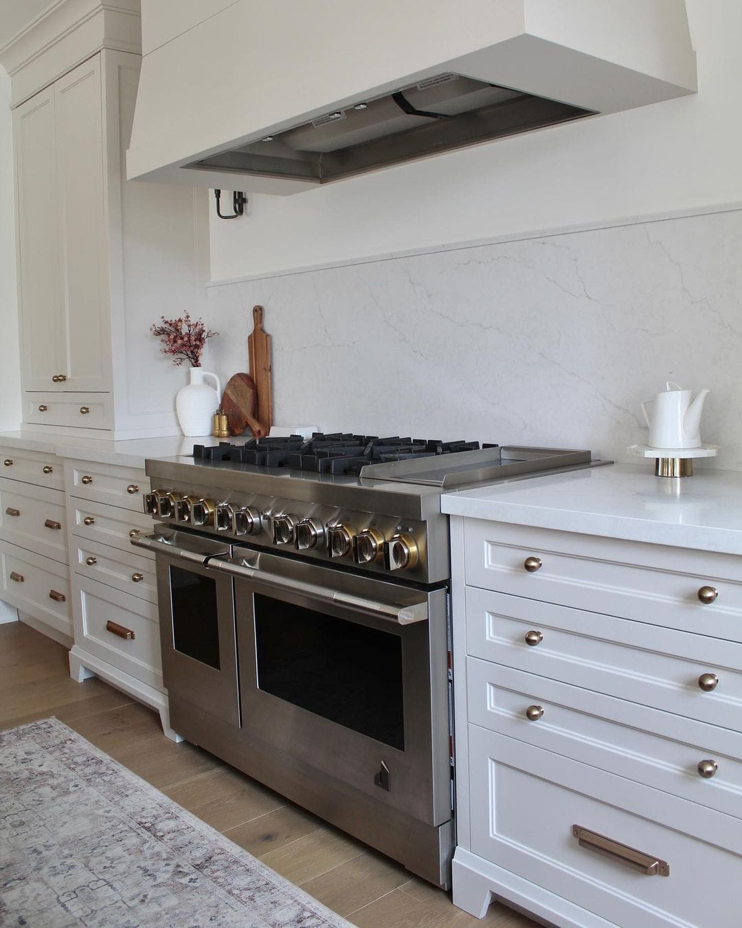 Creamy White Drawers with Mixed Hardware for a Layered Look